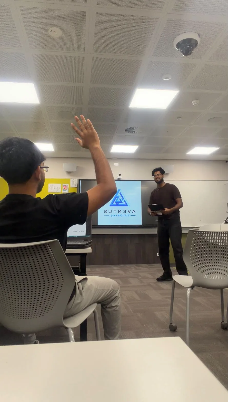 Aventus tutor leading a classroom discussion