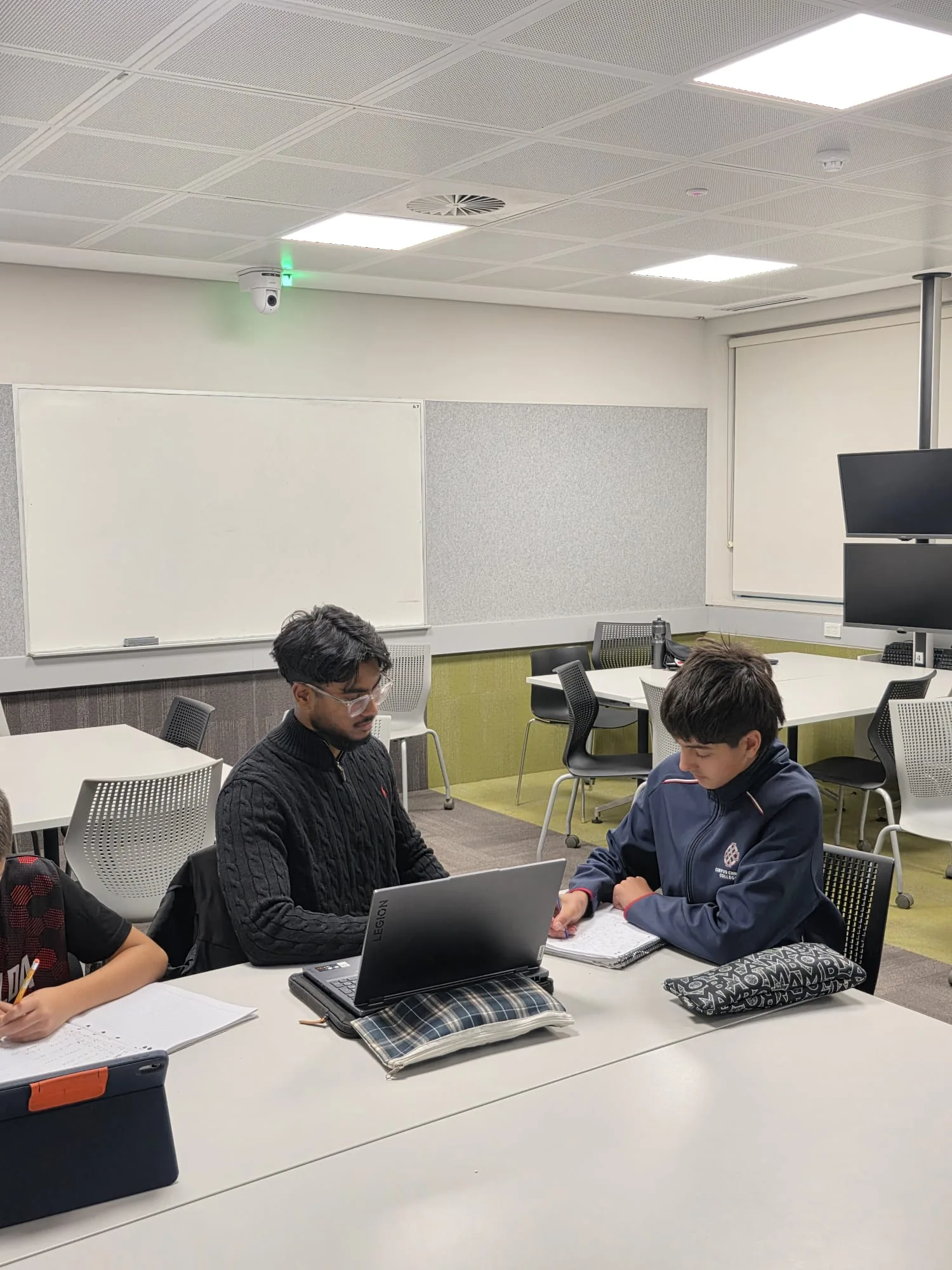 Aventus tutor working closely with a student
